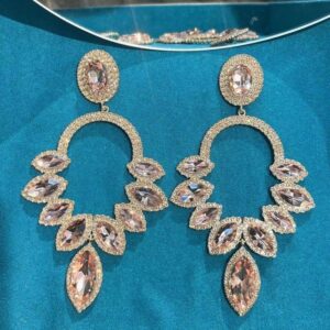 Aretes lujosos elegantes  / color champagne