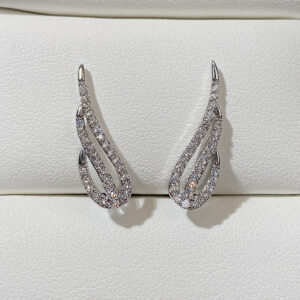 ARETES EN FORMA DE ALAS CON CIRCONES A LOS BORDES