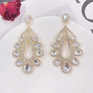 Aretes elegantes diamante estilo gota a los costados gold color / grandes